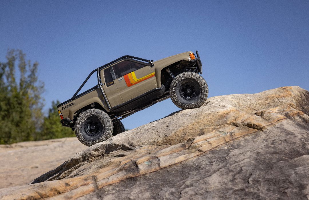 Axial 1/10 SCX10 III 1987 Toyota SR5 Brushed 4x4 RTR - Tan Axial 1/10 SCX10 III 1987 Toyota SR5 Brushed 4x4 RTR - Tan