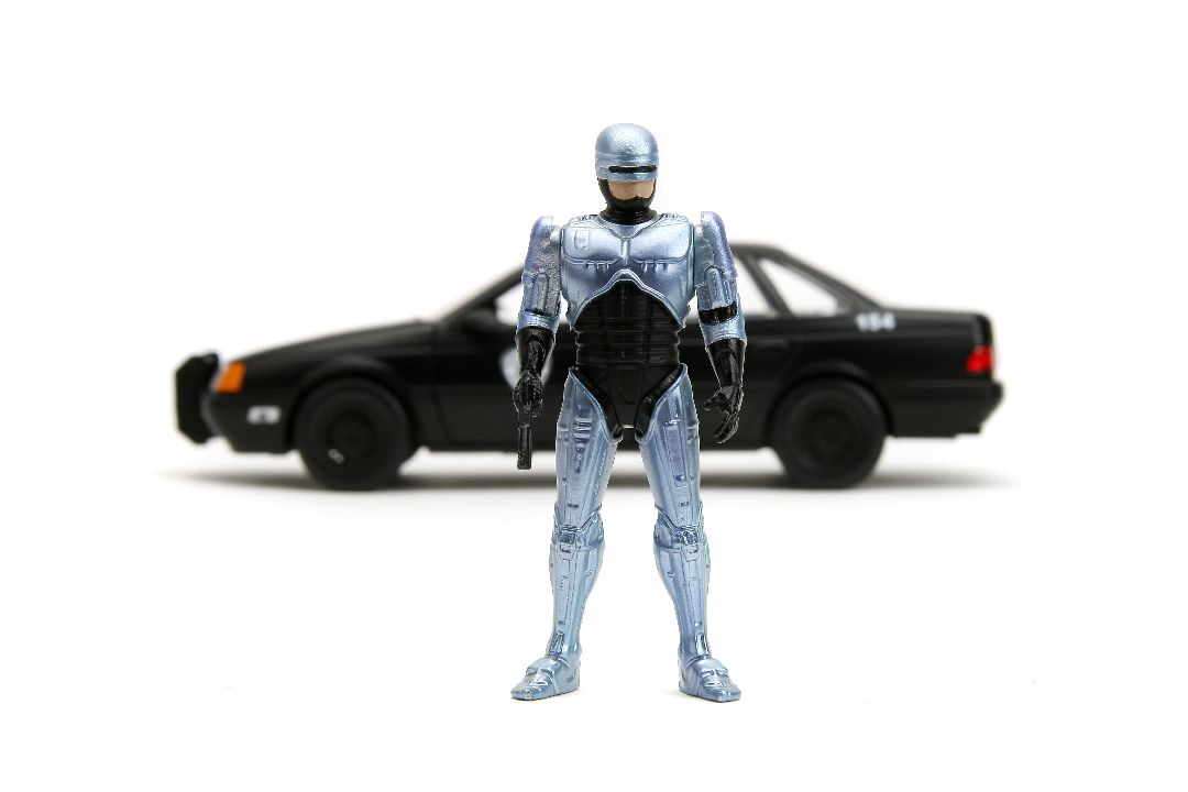 Jada 1/24 "Hollywood Rides" 1986 OCP Ford Taurus With RoboCop - Click Image to Close