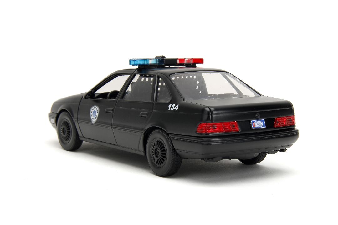Jada 1/24 "Hollywood Rides" 1986 OCP Ford Taurus w/ RoboCop