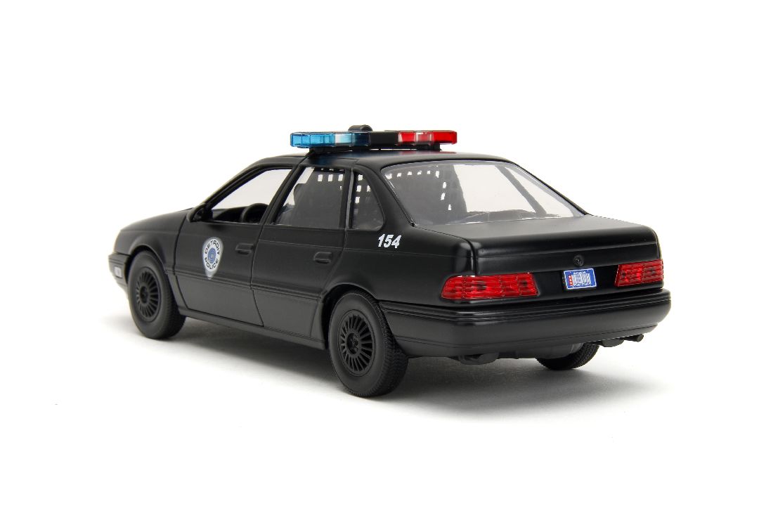 Jada 1/24 "Hollywood Rides" 1986 OCP Ford Taurus With RoboCop