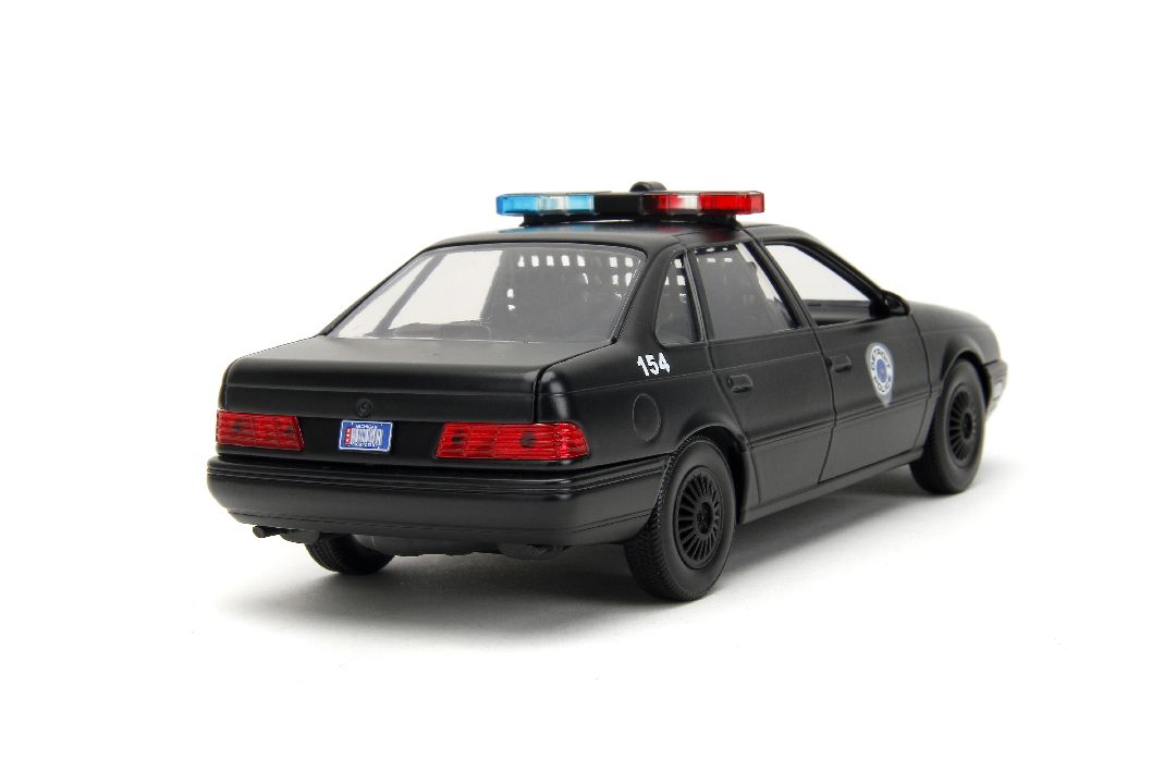 Jada 1/24 "Hollywood Rides" 1986 OCP Ford Taurus w/ RoboCop