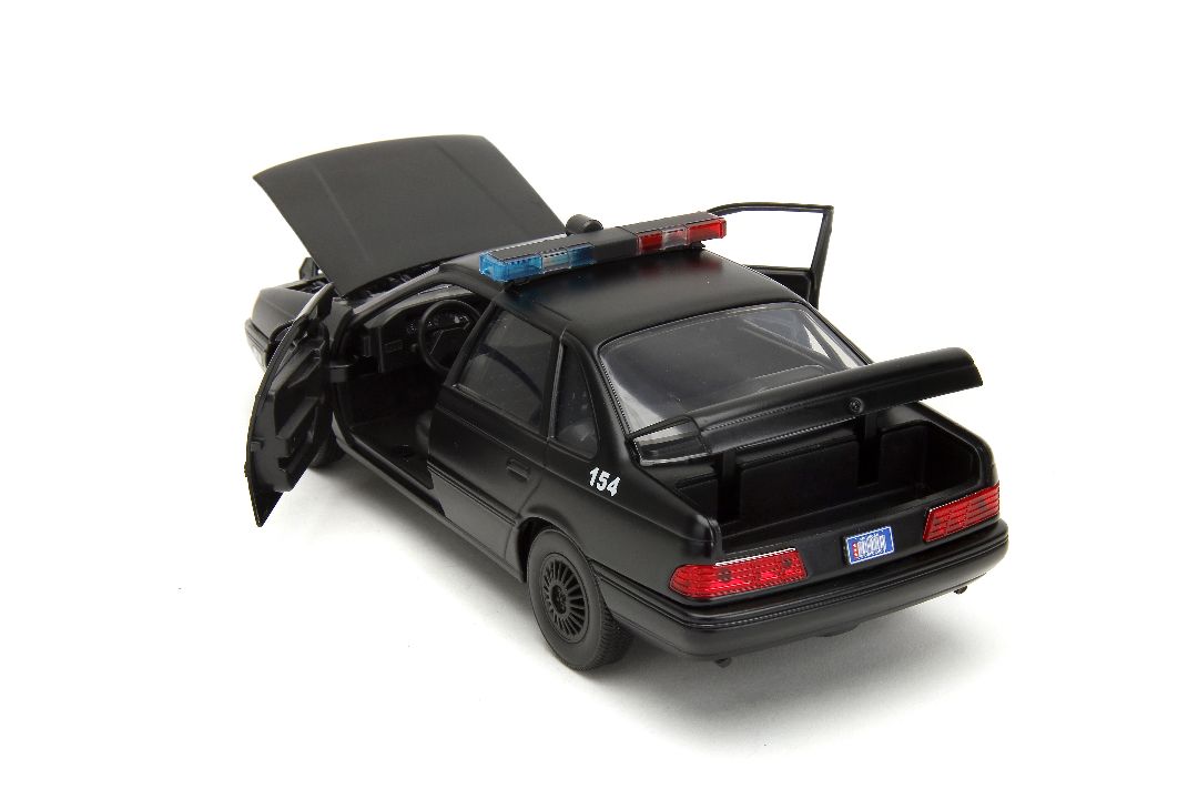 Jada 1/24 "Hollywood Rides" 1986 OCP Ford Taurus w/ RoboCop