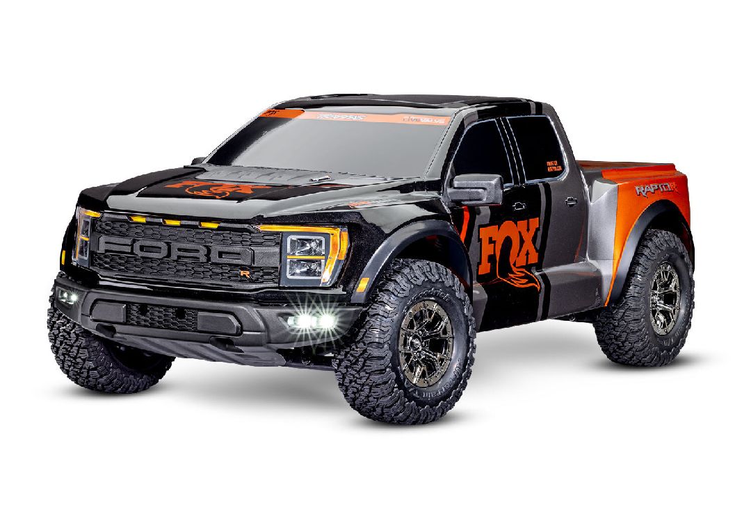 Traxxas Ford Raptor R (Fox): 1/10 Pro Scale 4WD Replica Truck. Ready-To-Race with TQi Traxxas Link Enabled 2.4GHz Radio System and Traxxas Stability Management (TSM). Brushless VXL-3s ESC (Fwd/Rev). Requires: Battery and Charger