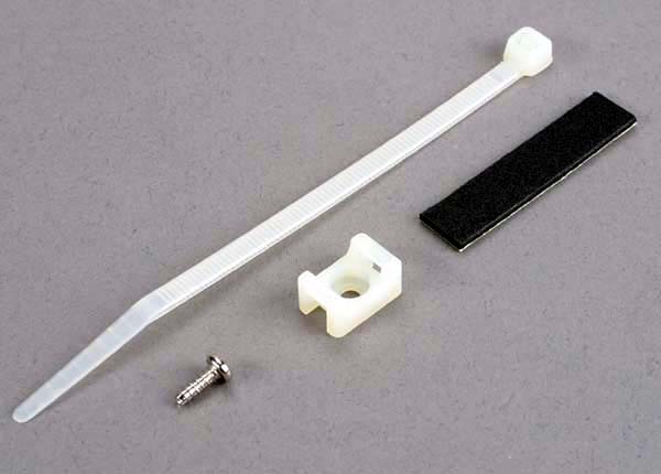 Traxxas Attachment Bracket, Plug/ Foam Tape/Tie Wrap/ 3x10mm Wst Screw (Old Style, Replace With 4132)